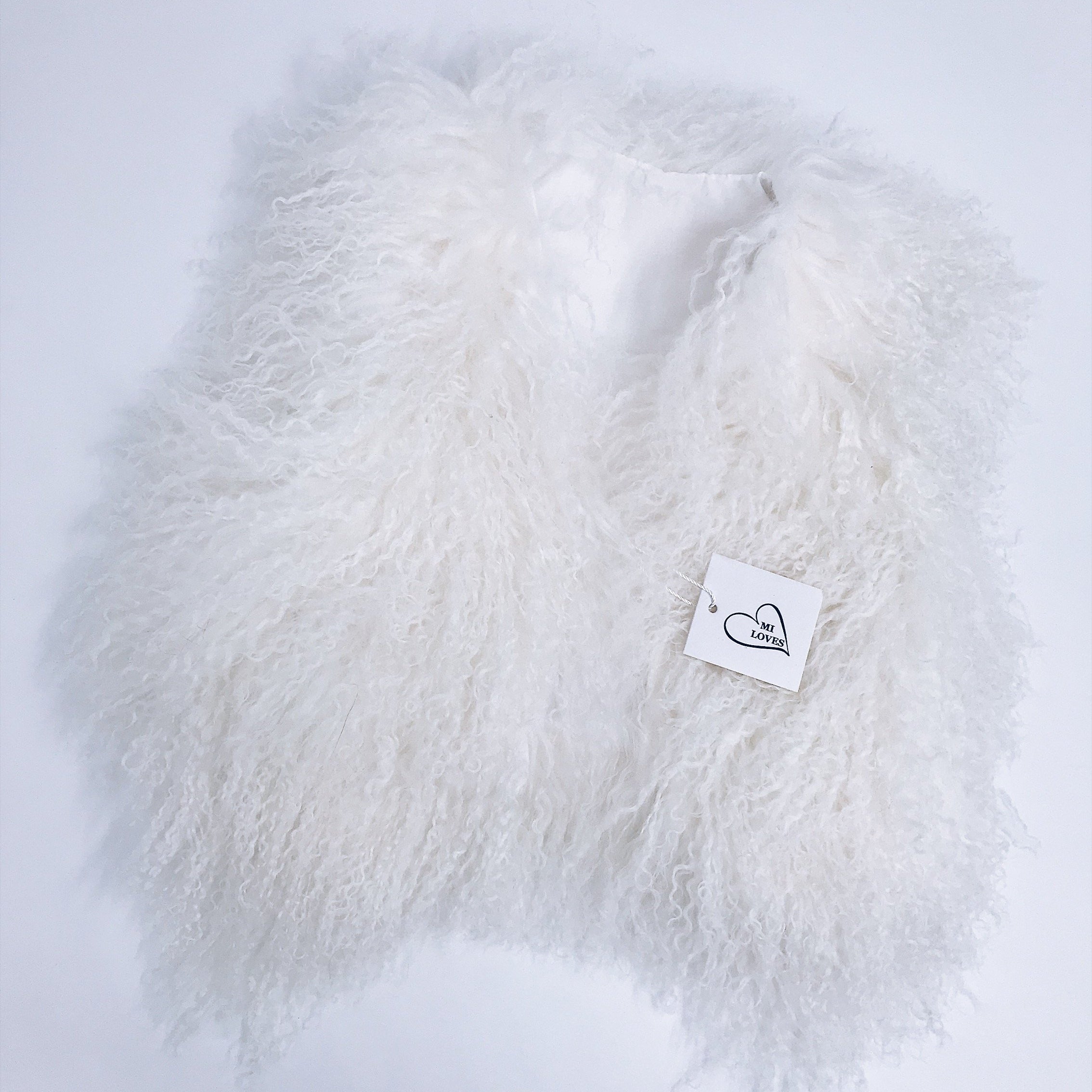 MILOVES Signature Luxurious Mongolian fur kids vest in Ivory/White.