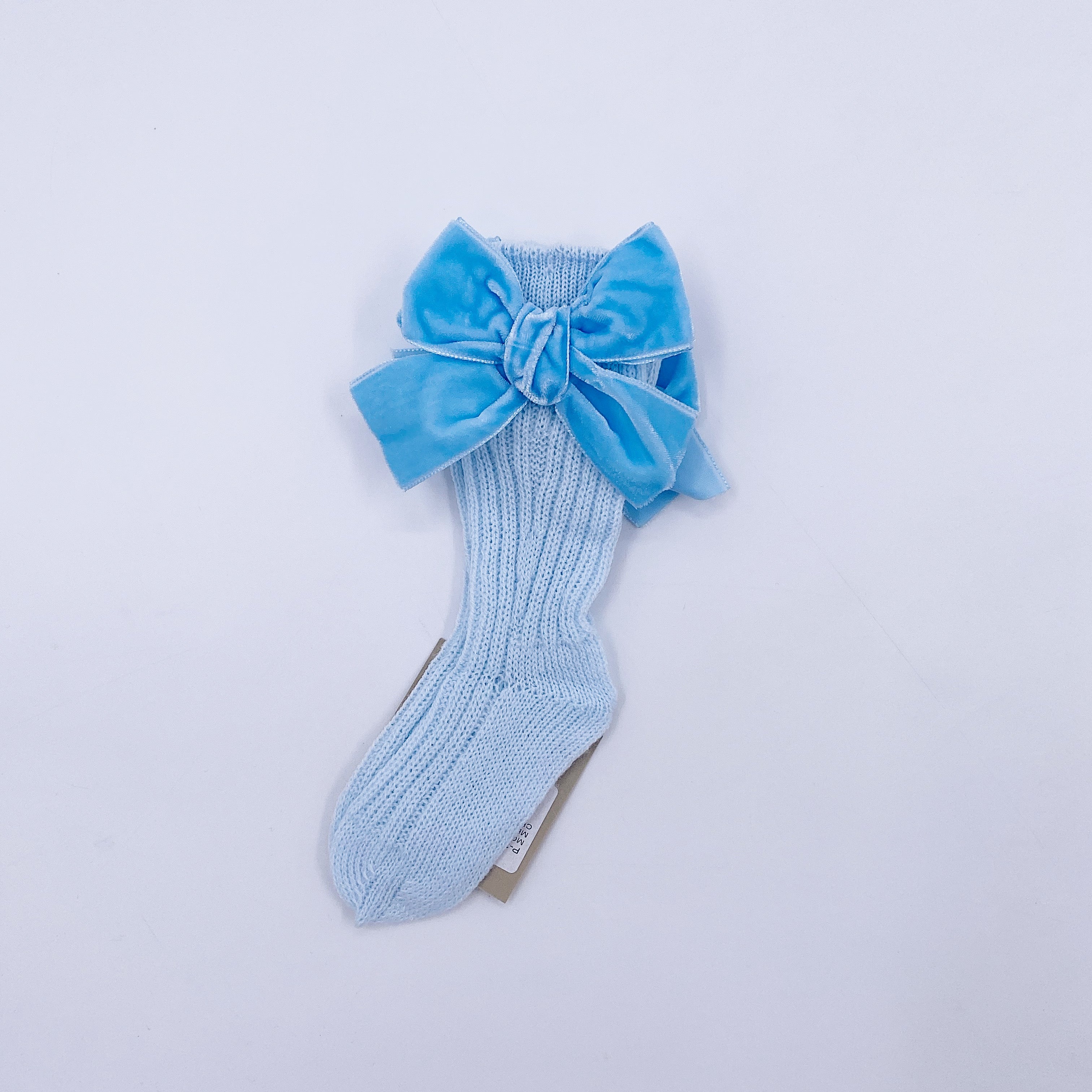 Beautiful knitted socks with Luxurious velvet bows.