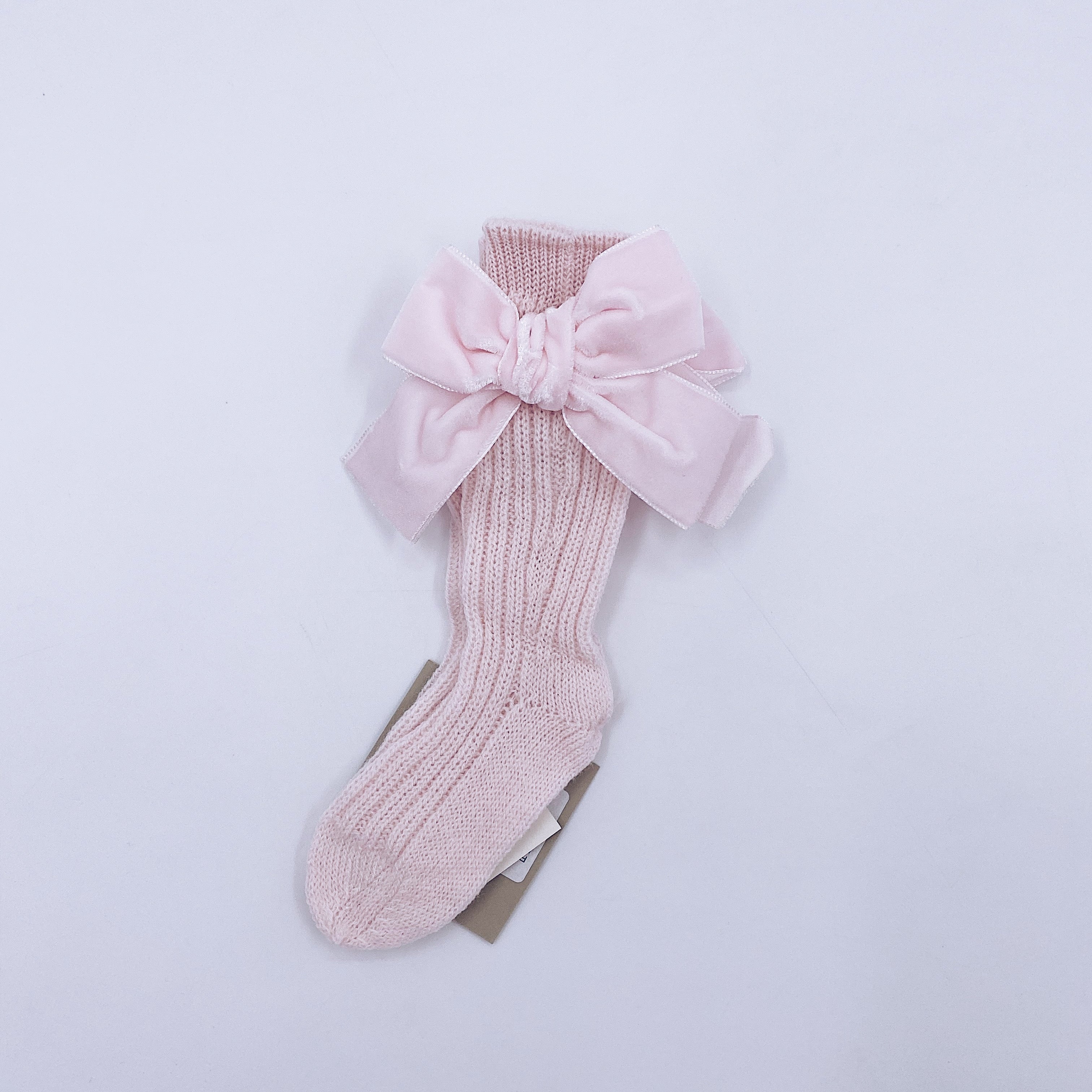 Beautiful knitted socks with Luxurious velvet bows.