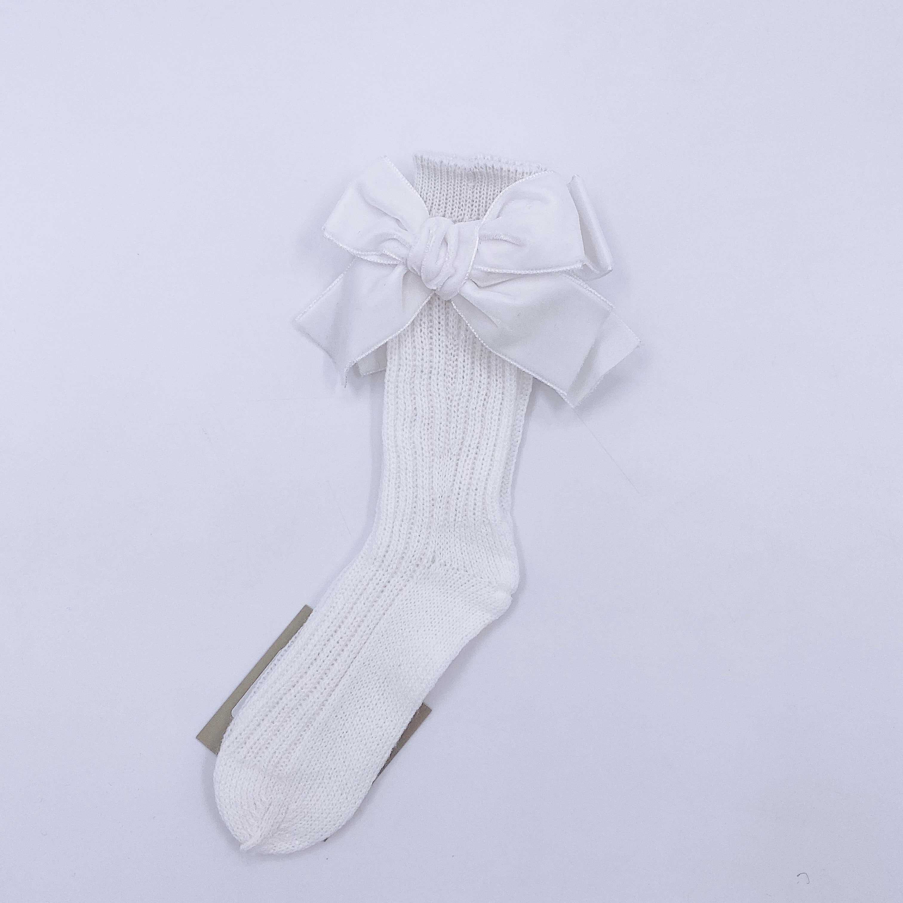 Beautiful knitted socks with Luxurious velvet bows.