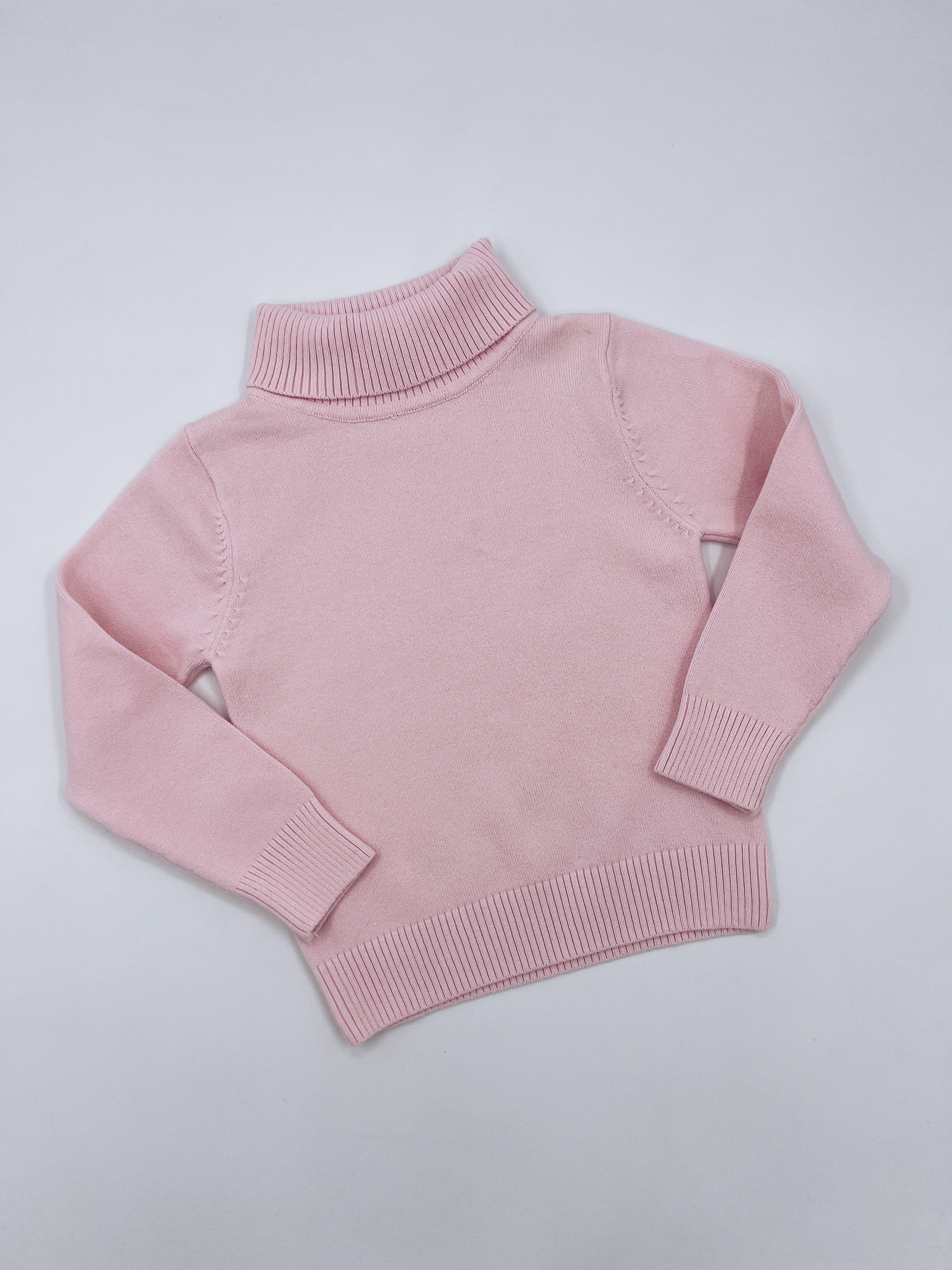 Turtleneck jumper.