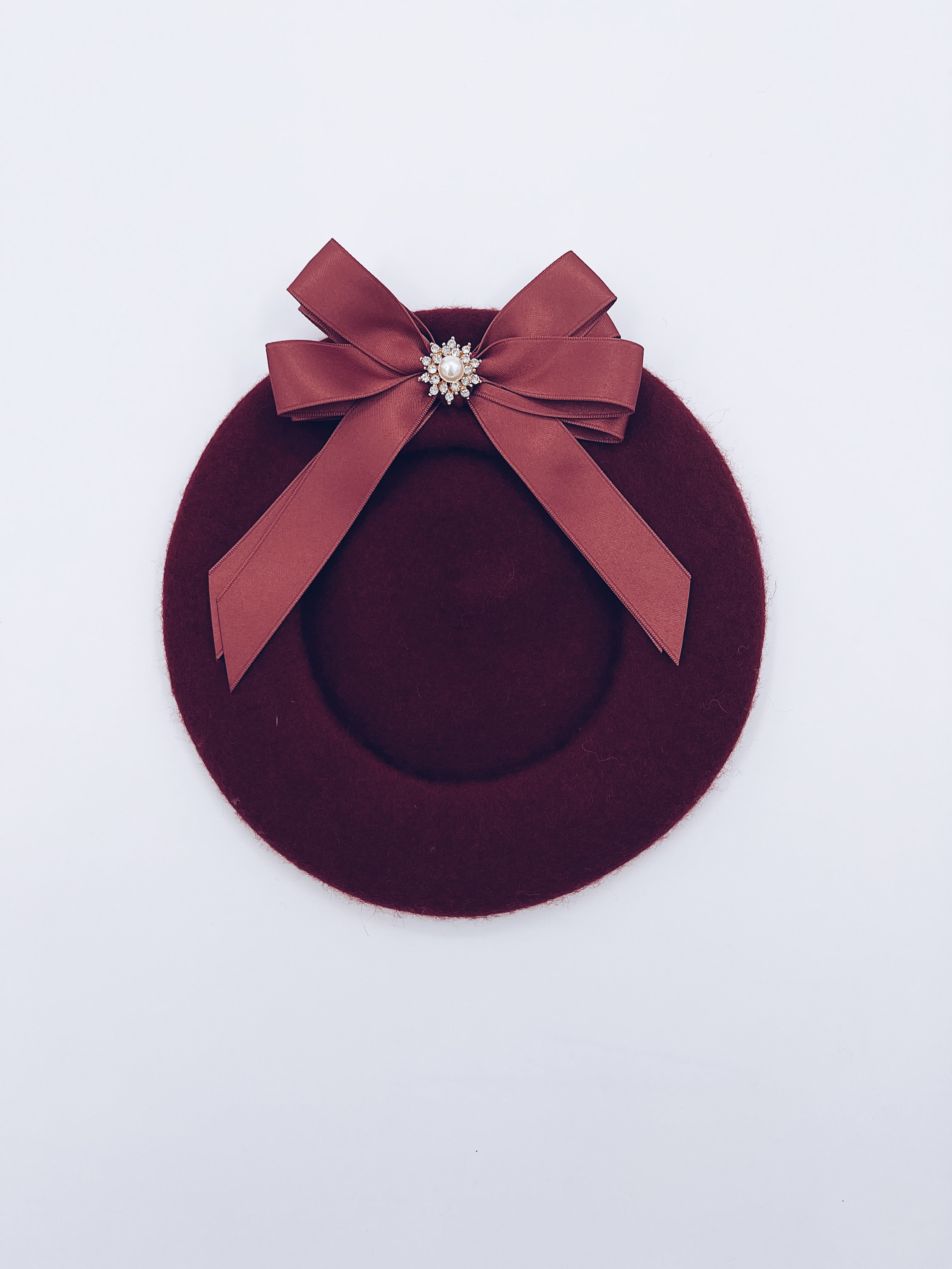 Classic Kids wool beret with beautiful bow details.