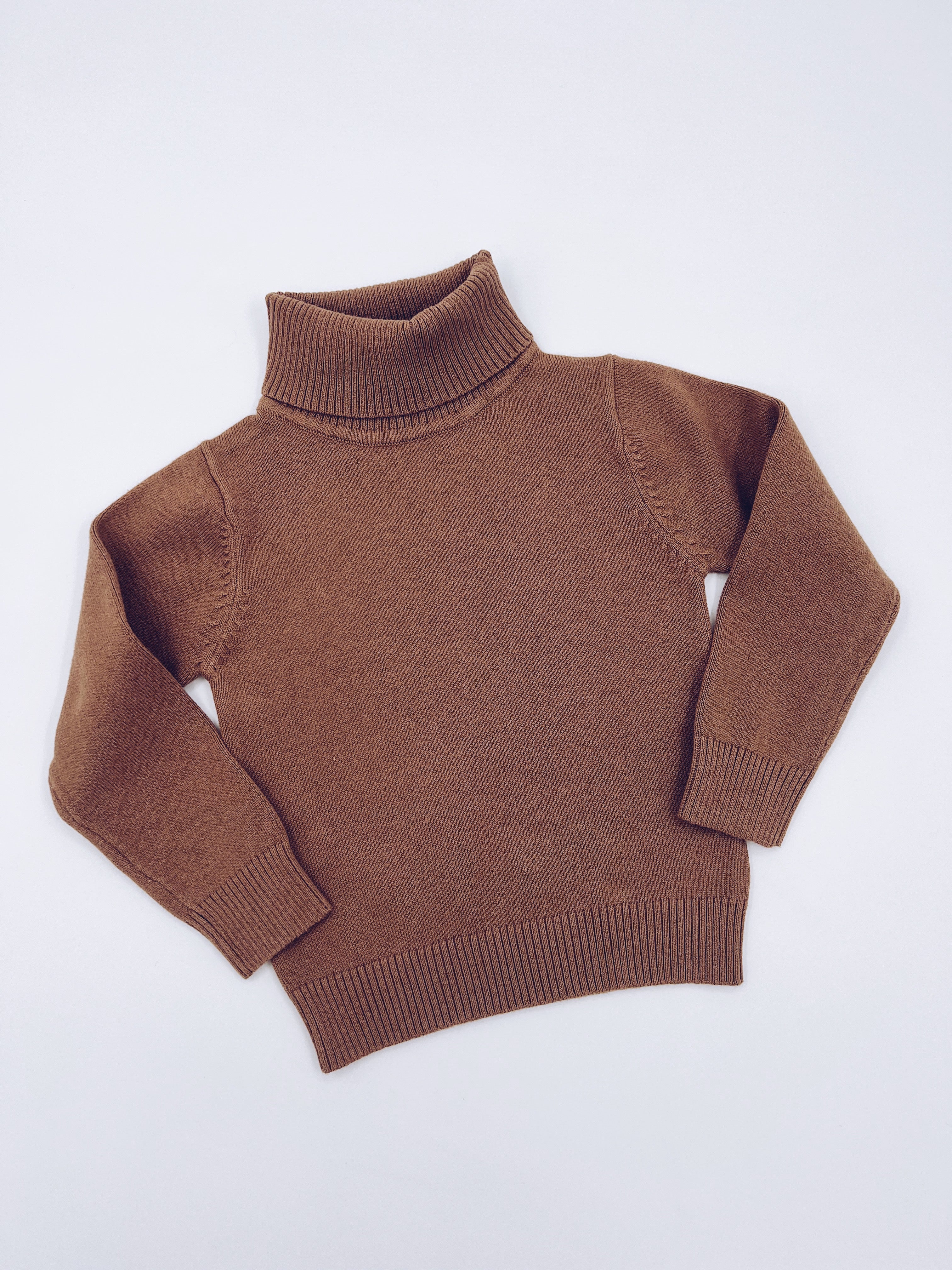 Turtleneck jumper.