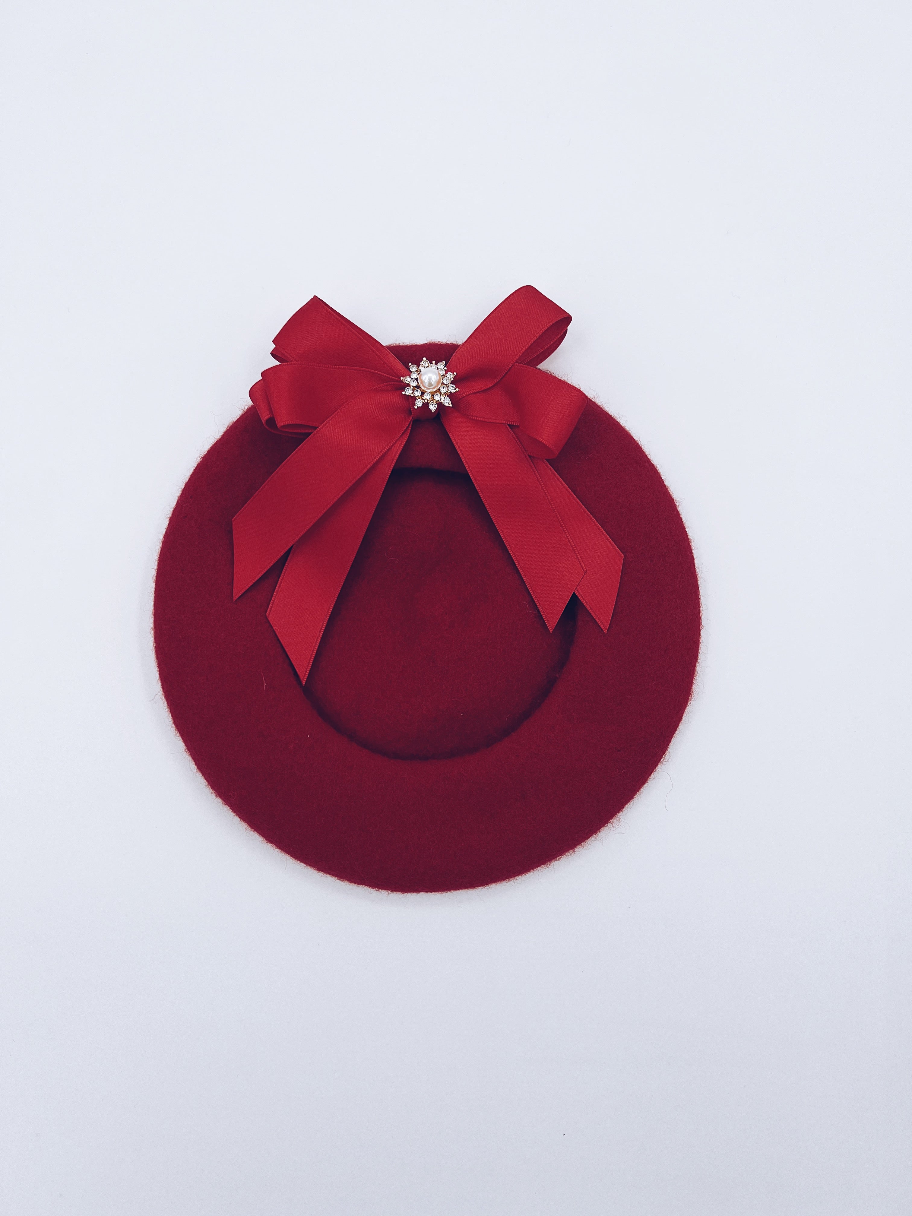Classic Kids wool beret with beautiful bow details.