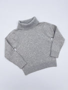 Turtleneck jumper.