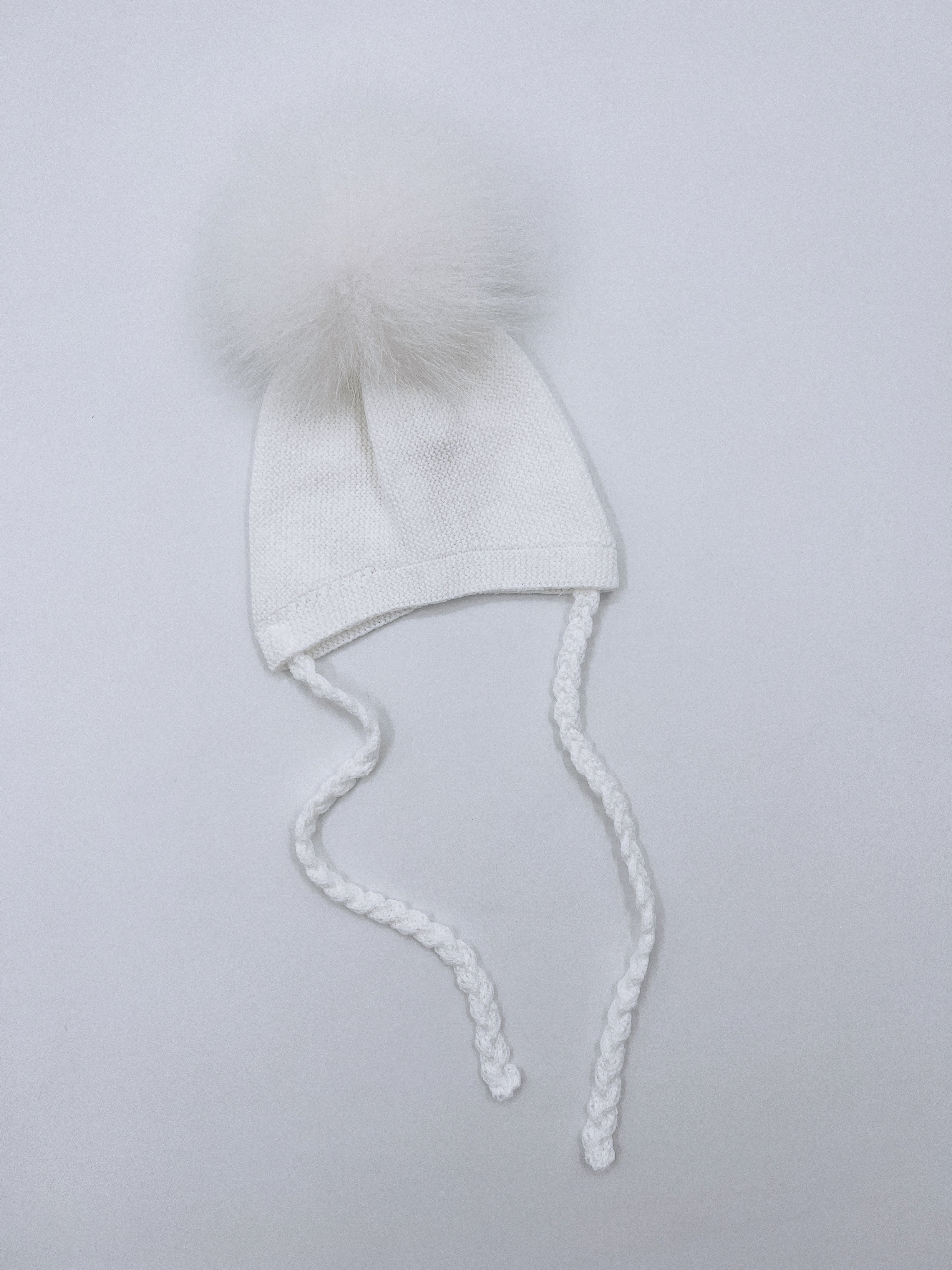 Luxurious knitted Pompom hat with Fox fur pompom.