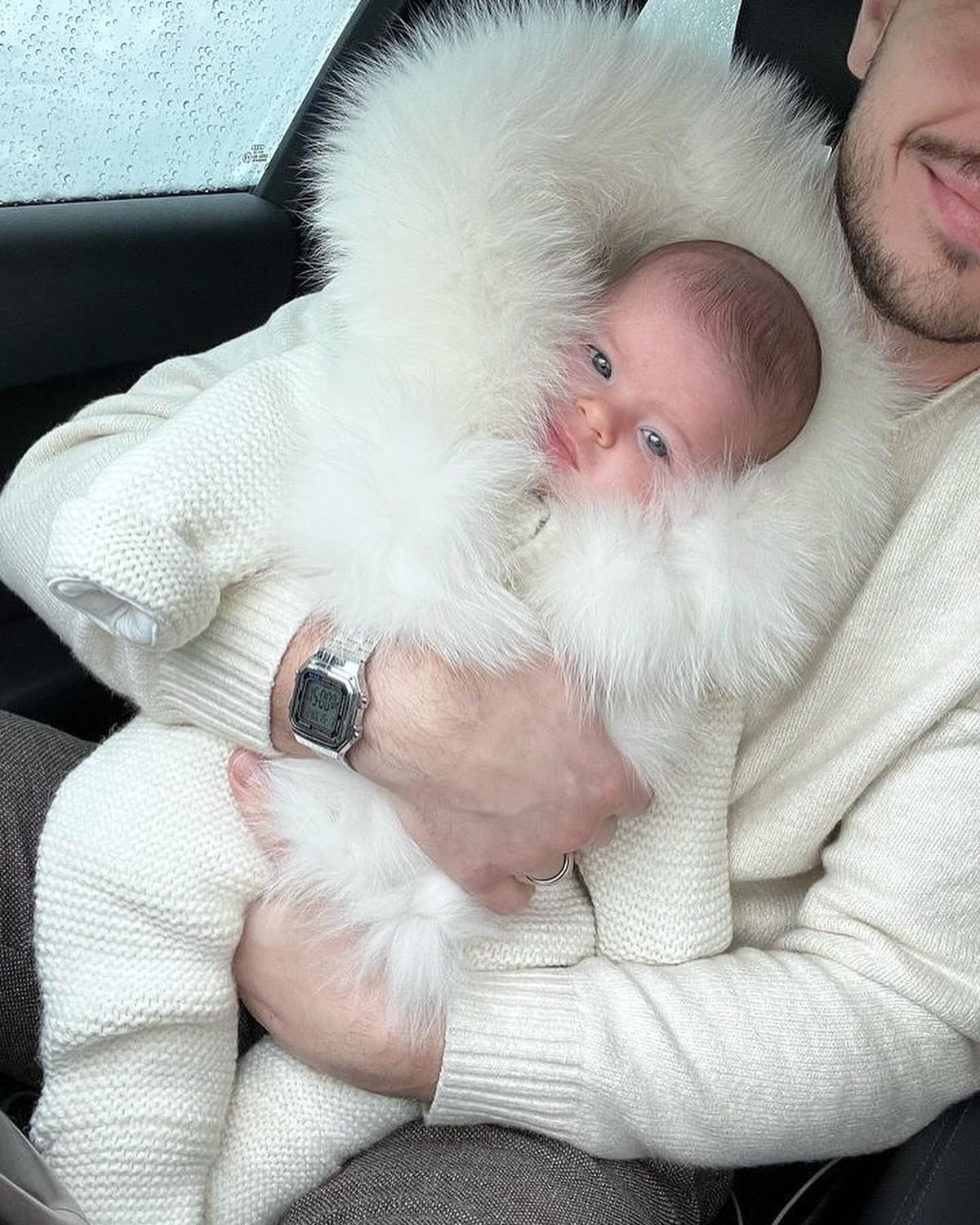 MI LOVES SIGNATURE Cream Knitted Pramsuit with Luxurious Fox fur trim.