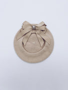 Classic Kids wool beret with beautiful bow details.
