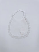 Beautiful baby bib with lace details