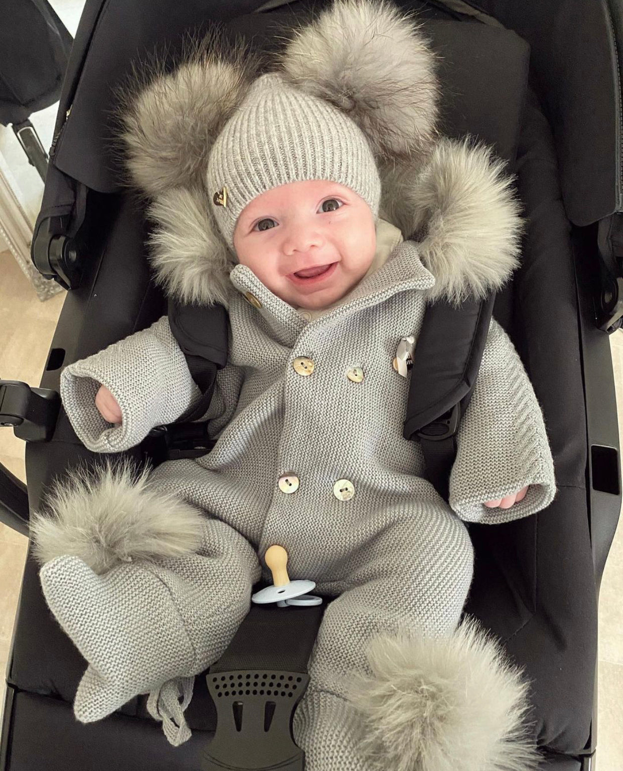 MI LOVES SIGNATURE Luxurious knitted Pramsuit with Faux fur trim/pom-poms