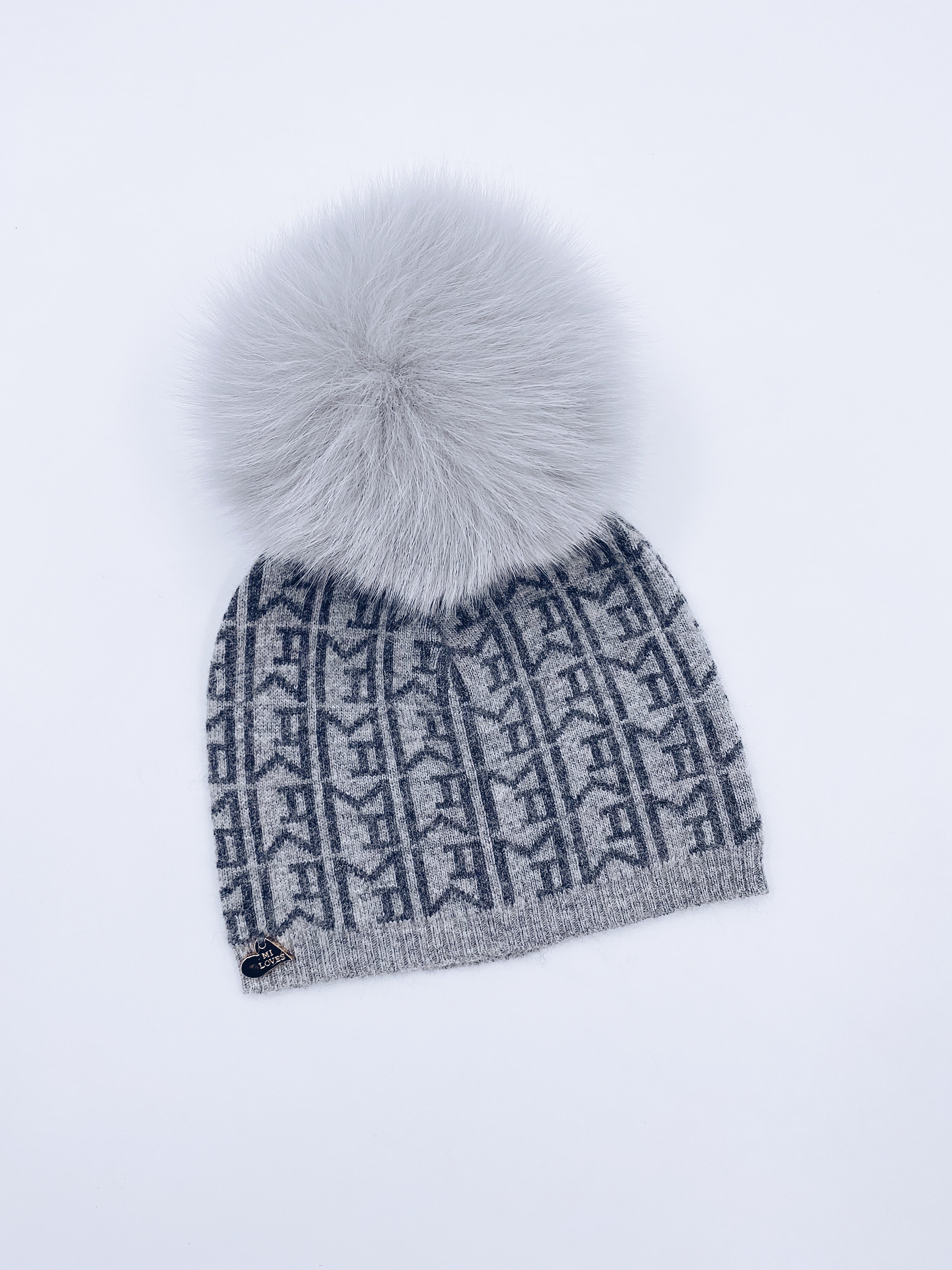 MI LOVES SIGNATURE MONOGRAM Kids hat with Fox fur pompom.