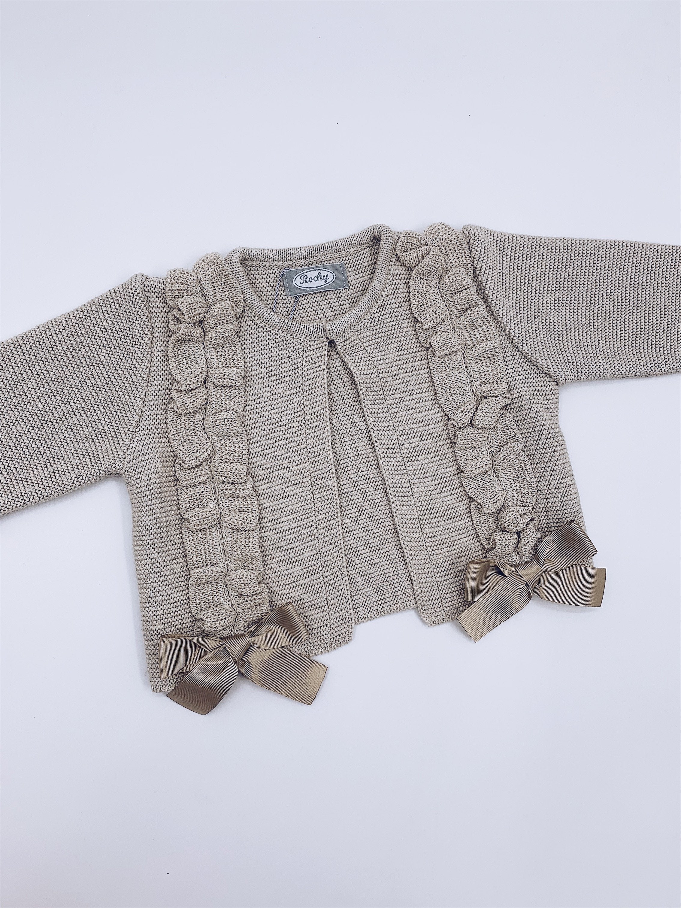 Beautiful Rochy knitted Cardigan with frills and Bow details(ALL COLOURS)