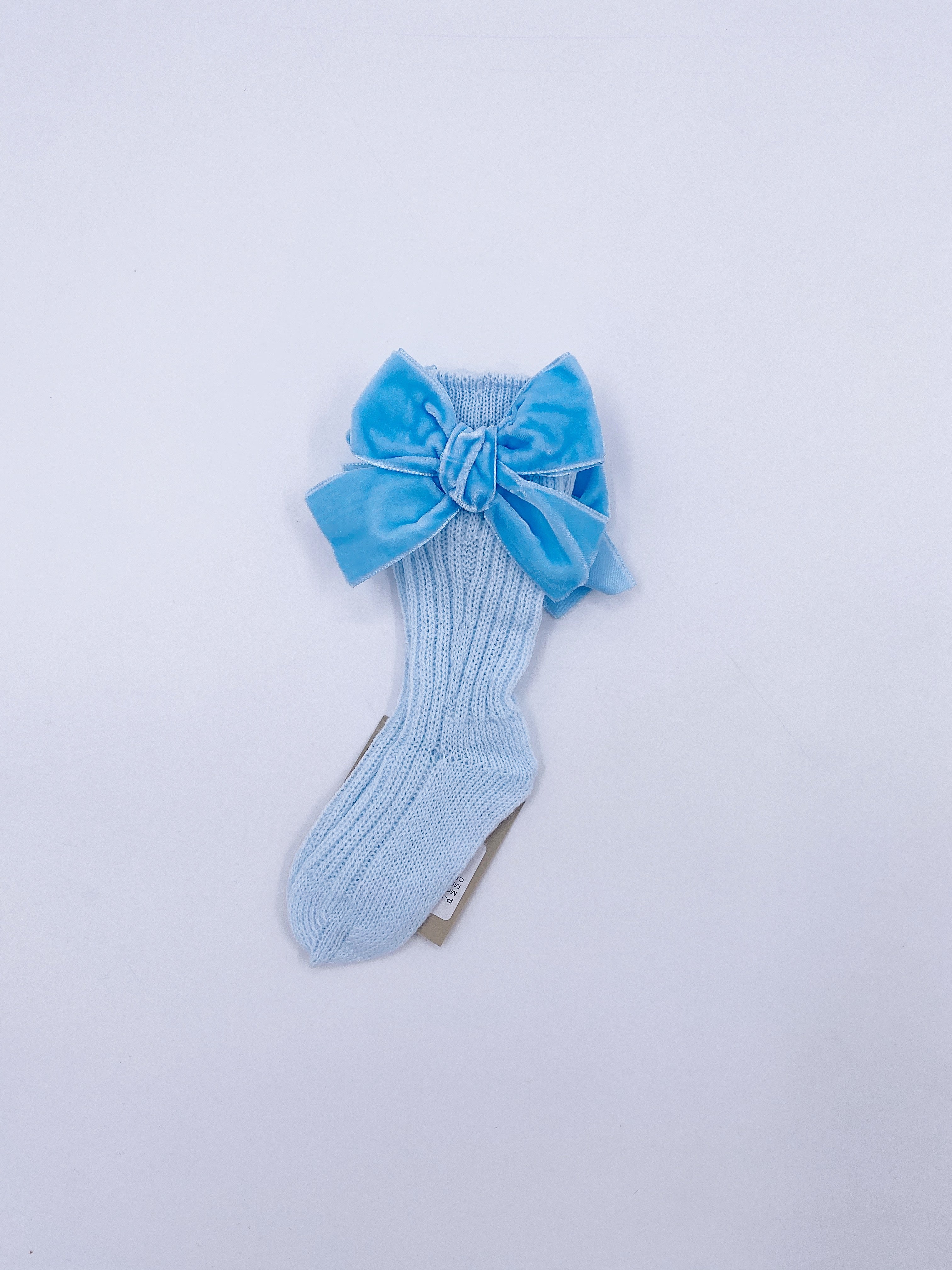 Beautiful knitted socks with Luxurious velvet bows.