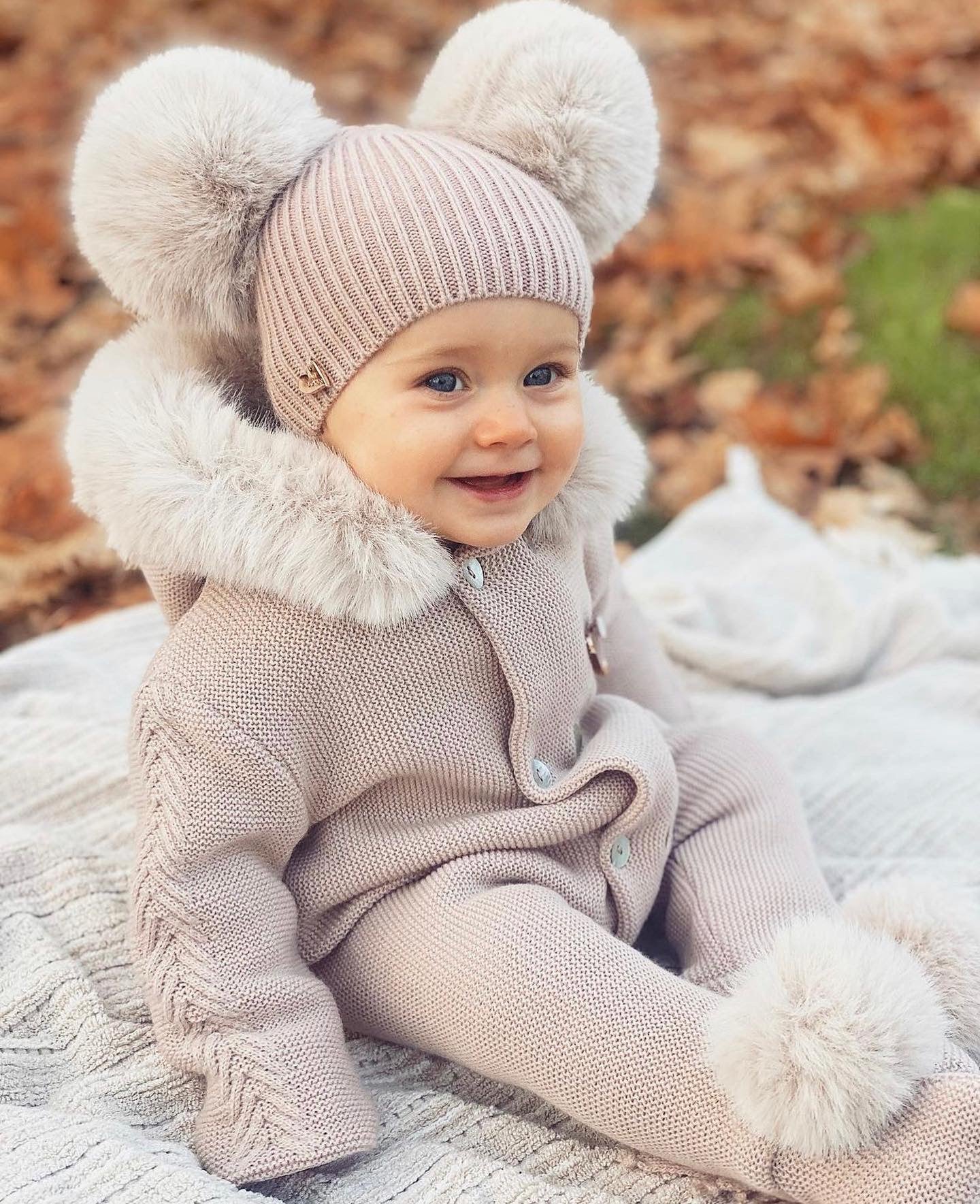 MI LOVES SIGNATURE Luxurious knitted Pramsuit with Faux fur trim/pom-p