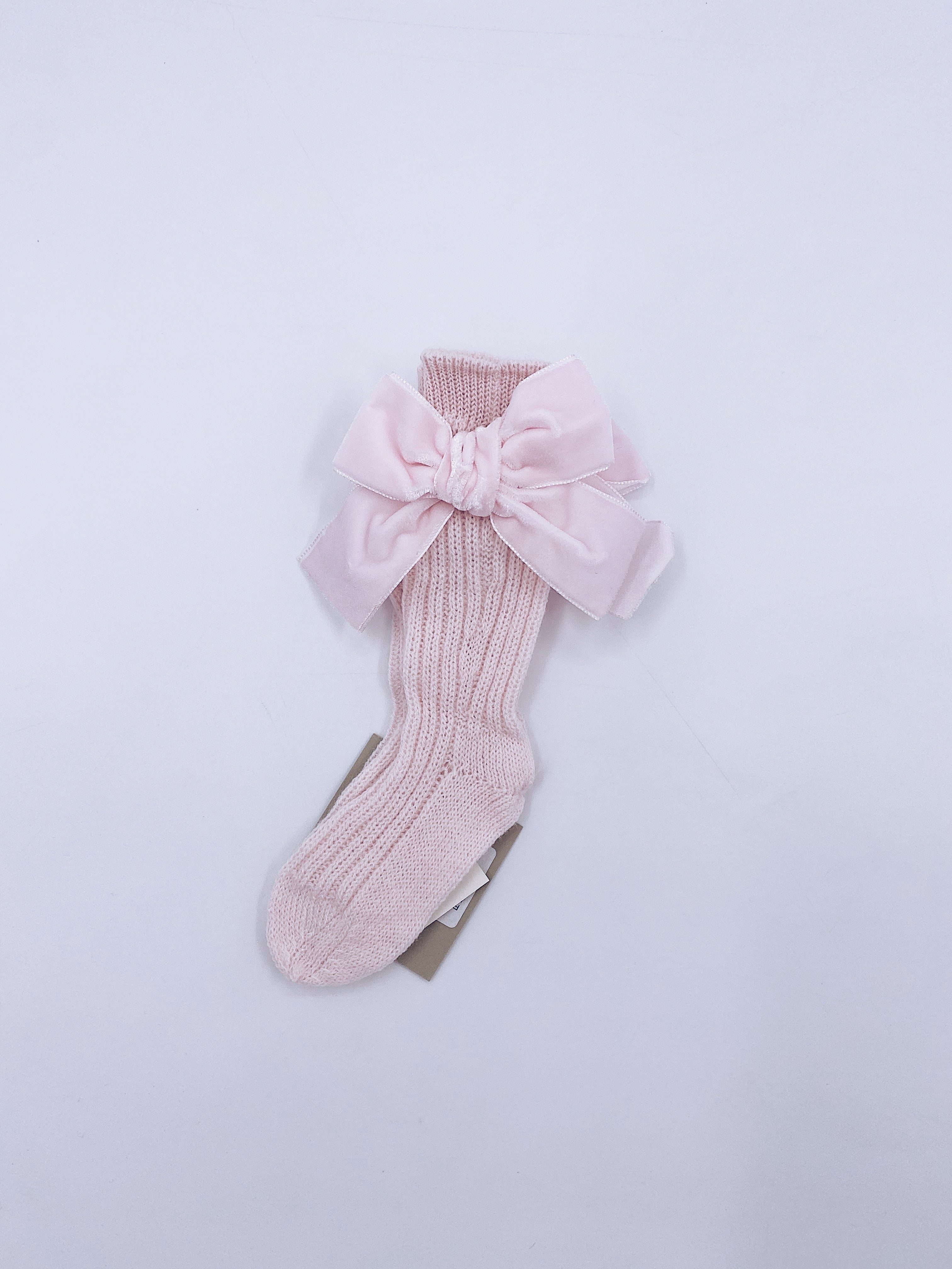 Beautiful knitted socks with Luxurious velvet bows.